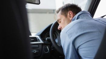 Driver passed out on front seat charged with DWI