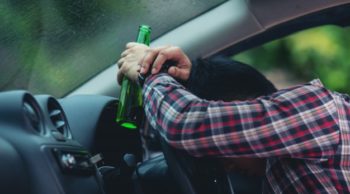Man passes out in the car while drunk driving