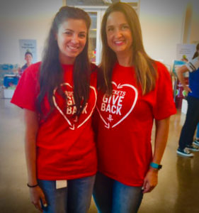 Randelyn Carpenter and JL Carpenter serving at the Houston Food Bank