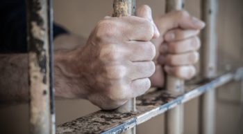 prison bars arrested wrongful death