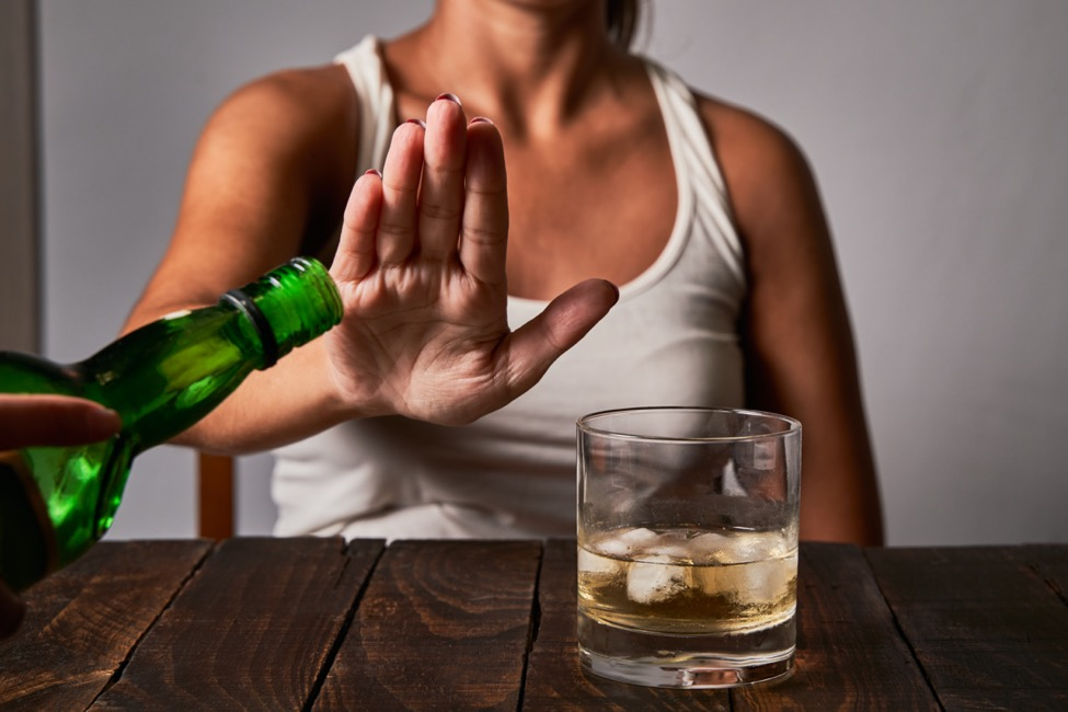 a woman refuses a drink to avoid DWI