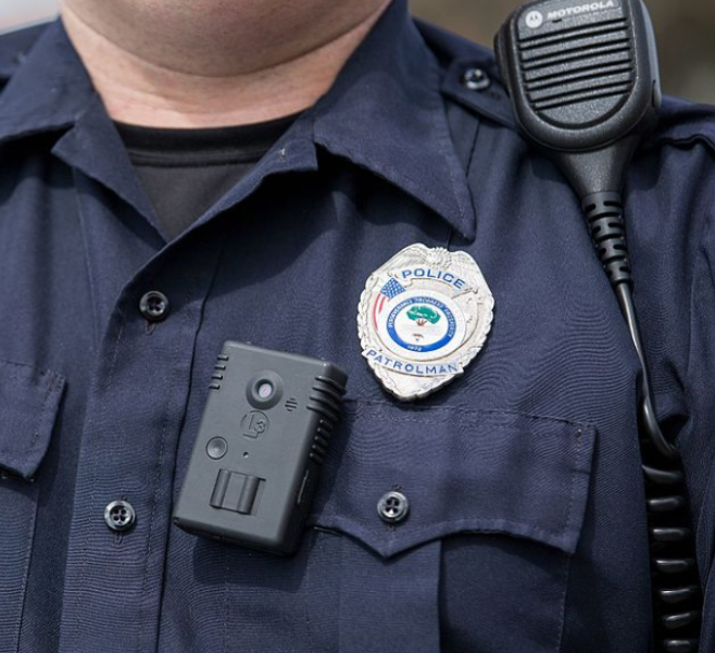 A police officer wearing a body camera