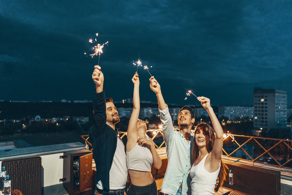 friends partying on a boat during NYE
